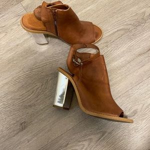 Genuine Leather booties with metallic heel